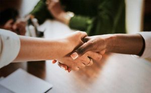 Women shaking hands
